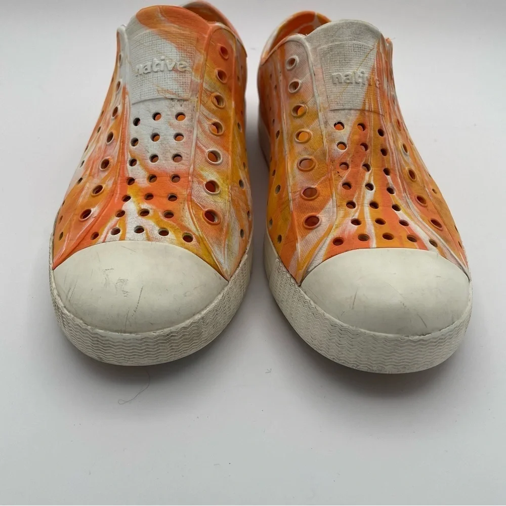 Native orange swirl slip on size 2 water shoes
